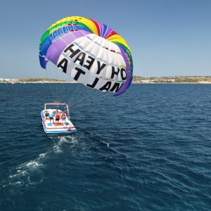 2 people doing parasailing